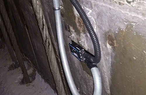 Mounting of the accelerometer on a concrete wall - SHM system